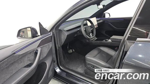 Tesla Model Y — Фото автомобиля 10