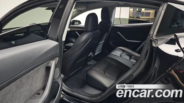 Tesla Model 3 — Фото автомобиля 18