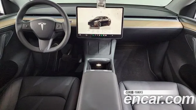 Tesla Model Y — Фото автомобиля 10