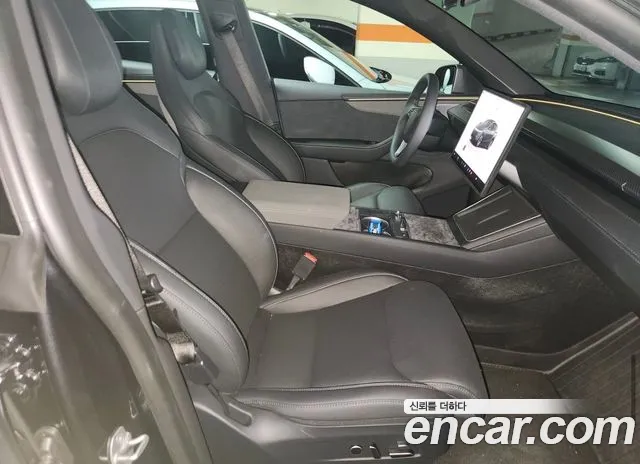 Tesla Model Y — Фото автомобиля 12