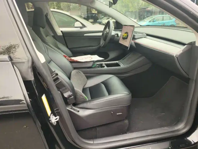 Tesla Model Y — Фото автомобиля 24