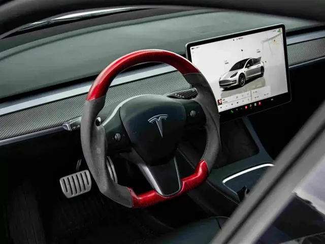 Tesla Model 3 — Фото автомобиля 11