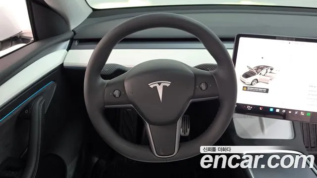 Tesla Model Y — Фото автомобиля 19