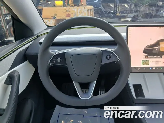 Tesla Model Y — Фото автомобиля 10