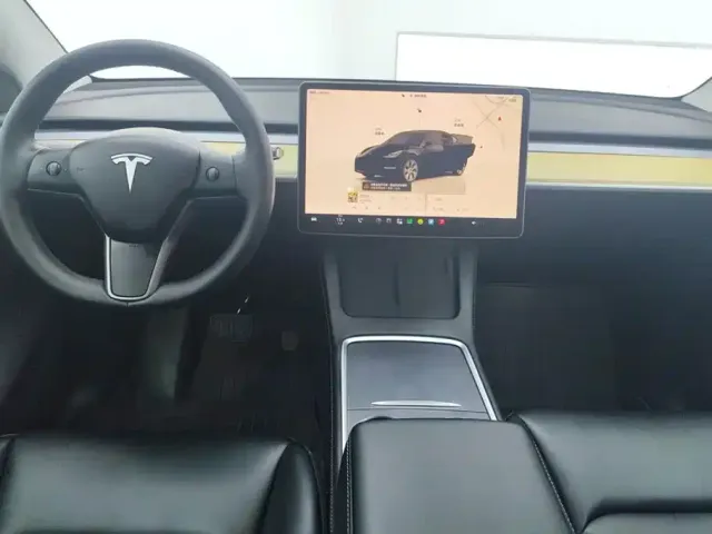 Tesla Model Y — Фото автомобиля 12