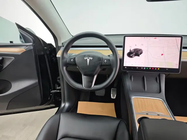 Tesla Model Y — Фото автомобиля 15