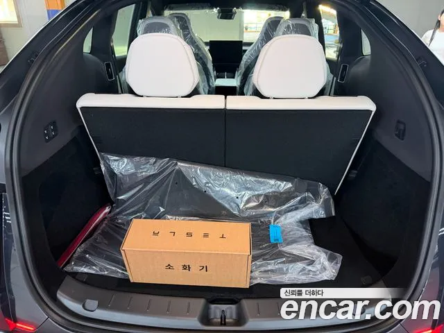 Tesla Model Y — Фото автомобиля 18