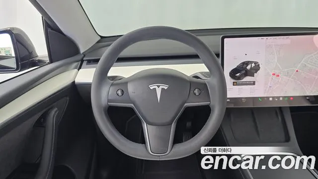 Tesla Model Y — Фото автомобиля 19