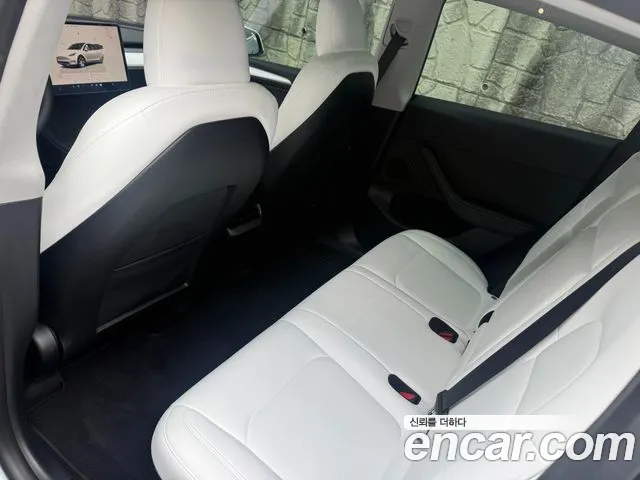 Tesla Model Y — Фото автомобиля 9