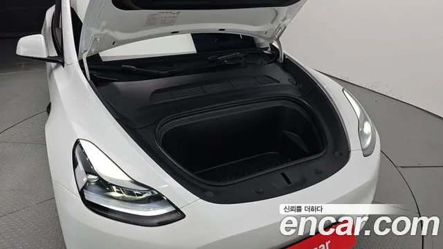Tesla Model Y — Фото автомобиля 6