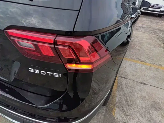 Volkswagen Tiguan L — Фото автомобиля 7