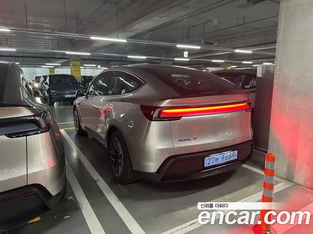 Tesla Model Y — Фото автомобиля 4