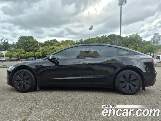 Tesla Model 3 — Фото автомобиля 13