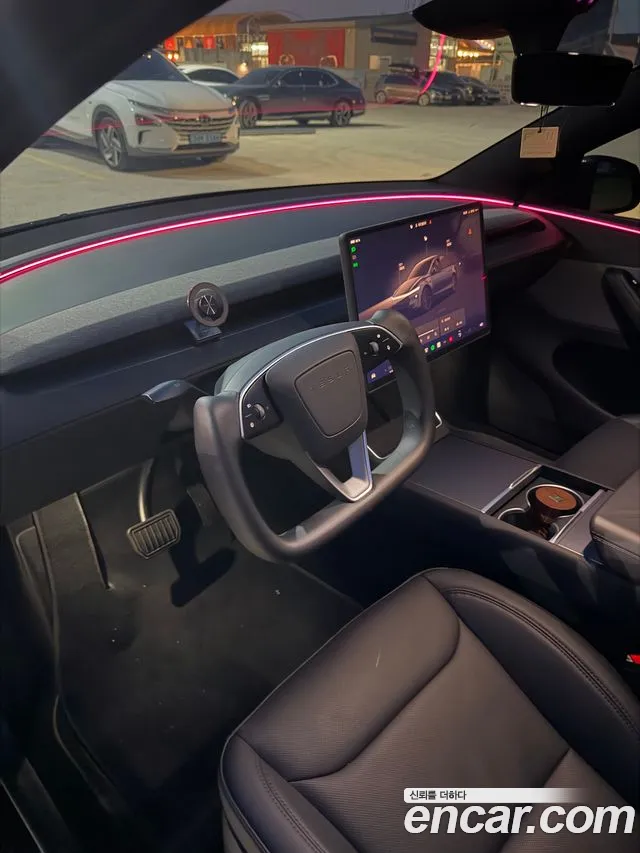 Tesla Model Y — Фото автомобиля 6