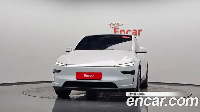 Tesla Model Y — Фото автомобиля 3