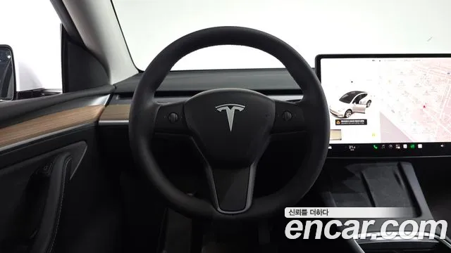 Tesla Model Y — Фото автомобиля 19