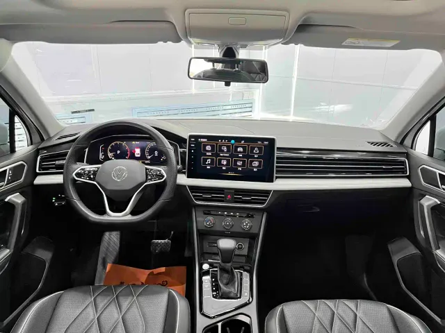 Volkswagen Tiguan L — Фото автомобиля 16