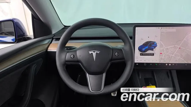 Tesla Model Y — Фото автомобиля 13