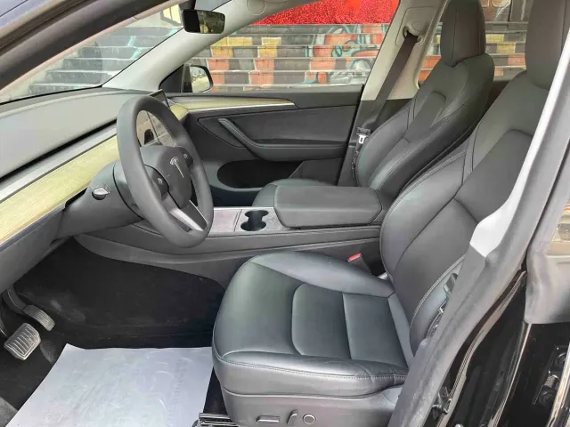 Tesla Model Y — Фото автомобиля 13