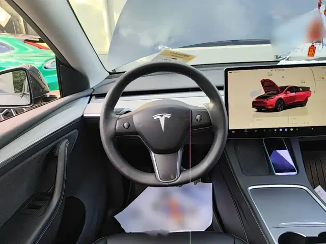 Tesla Model Y — Фото автомобиля 10