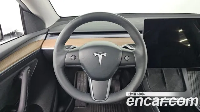 Tesla Model Y — Фото автомобиля 19