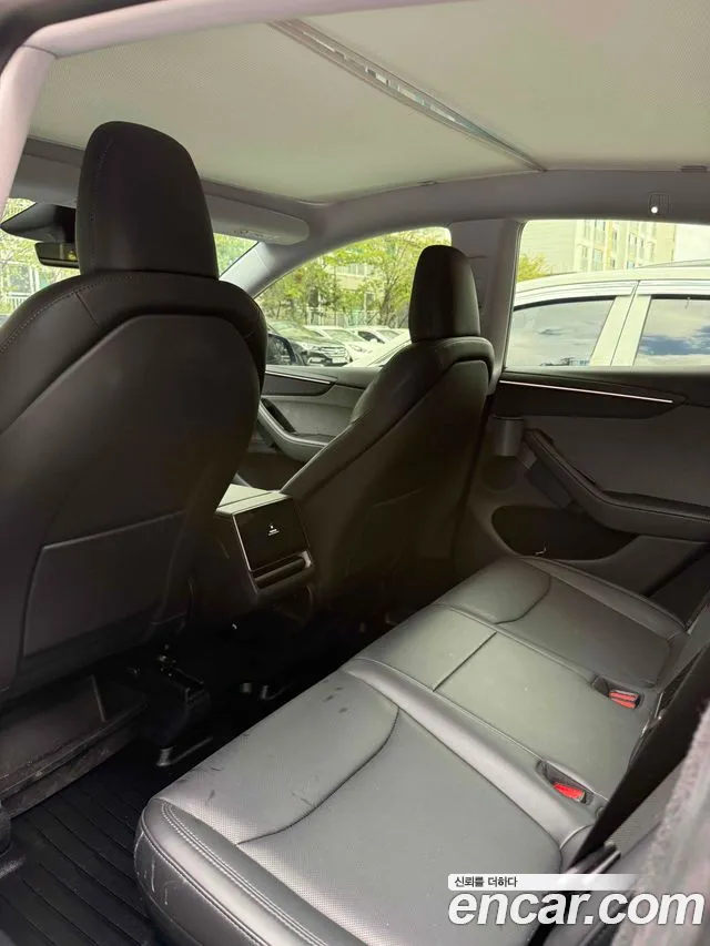 Tesla Model Y — Фото автомобиля 10