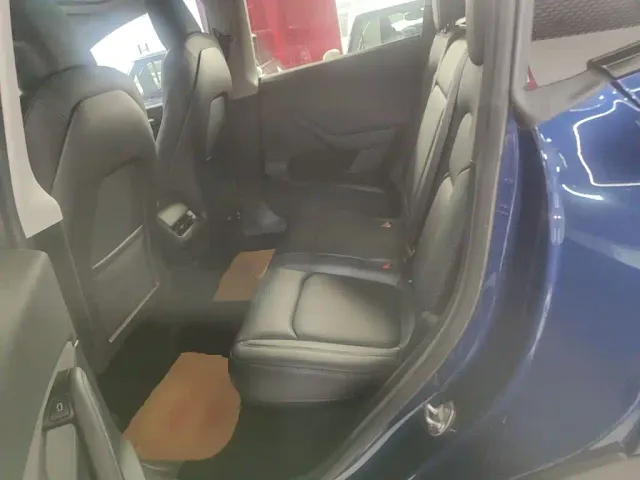 Tesla Model Y — Фото автомобиля 16