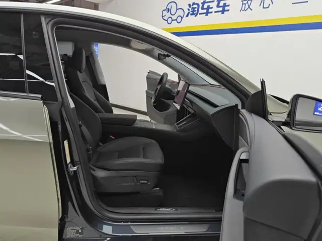 Tesla Model Y — Фото автомобиля 8