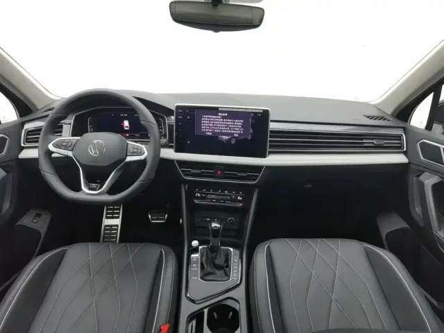 Volkswagen Tiguan L — Фото автомобиля 5