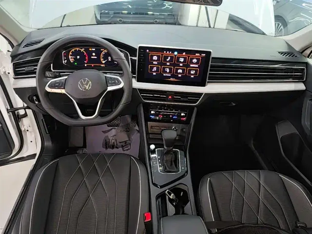 Volkswagen Tiguan L — Фото автомобиля 12