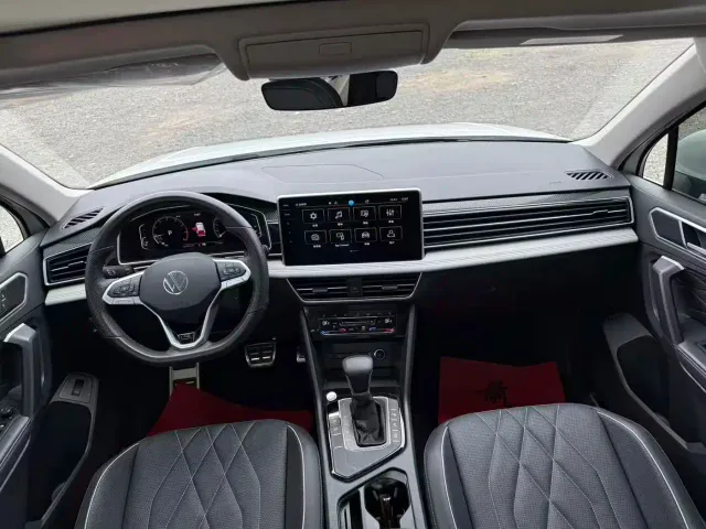 Volkswagen Tiguan L — Фото автомобиля 11