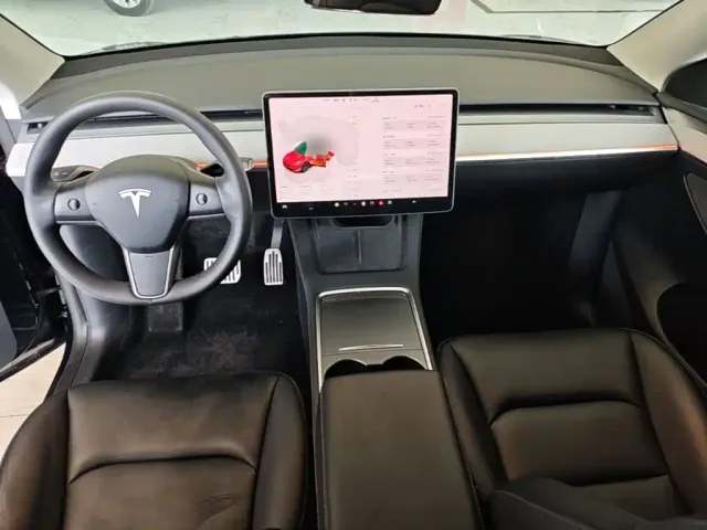 Tesla Model Y — Фото автомобиля 9