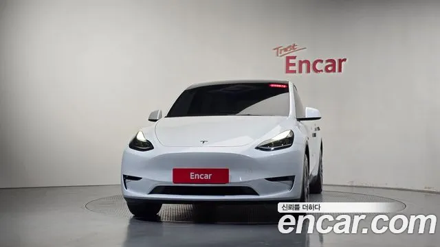 Tesla Model Y — Фото автомобиля 3