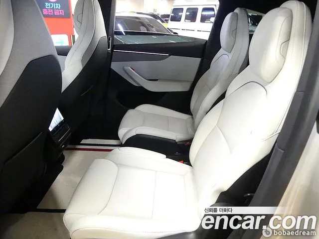 Tesla Model Y — Фото автомобиля 20