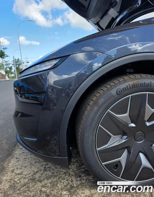 Tesla Model Y — Фото автомобиля 4
