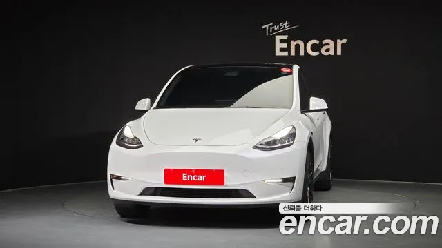 Tesla Model Y — Фото автомобиля 3