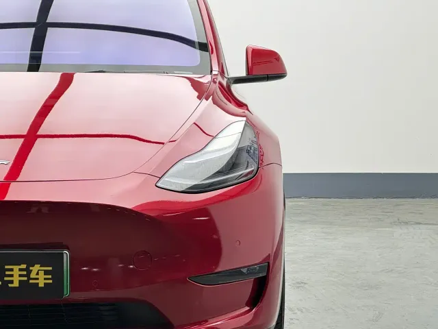 Tesla Model Y — Фото автомобиля 7