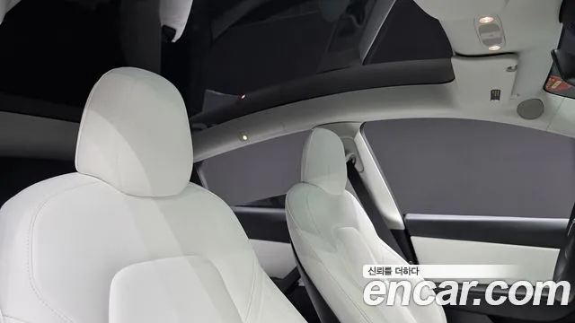 Tesla Model Y — Фото автомобиля 26