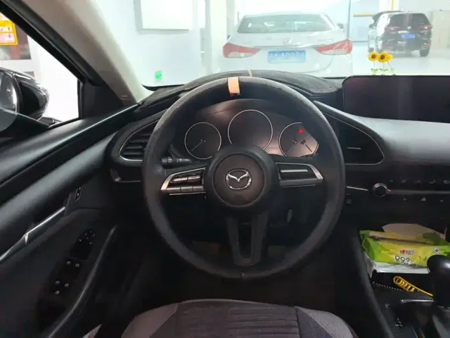 Mazda Axela — Фото автомобиля 14
