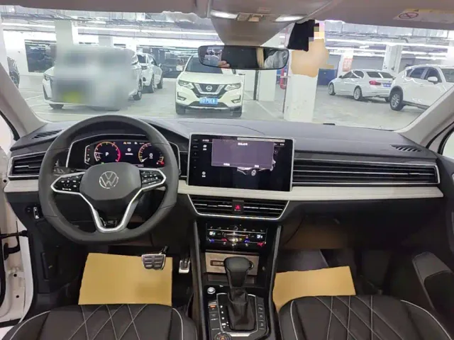 Volkswagen Tiguan L — Фото автомобиля 9