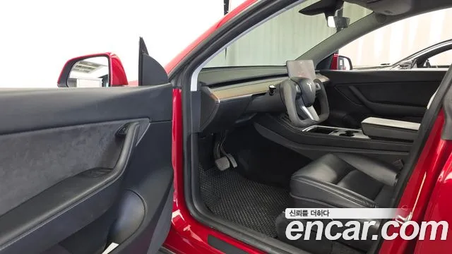 Tesla Model Y — Фото автомобиля 15