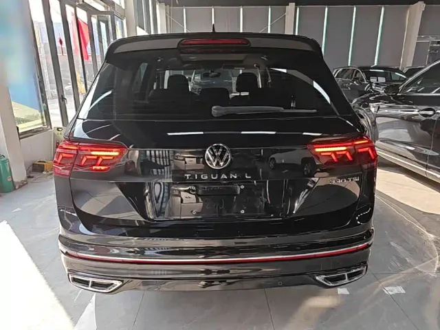 Volkswagen Tiguan L — Фото автомобиля 5