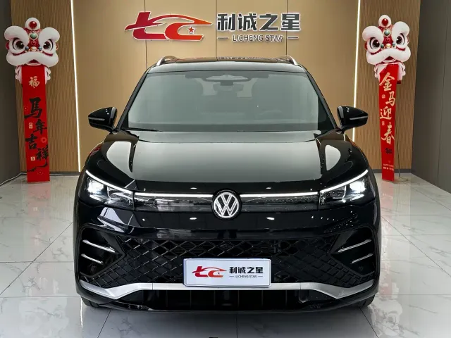 Volkswagen Tiguan L — Фото автомобиля 2