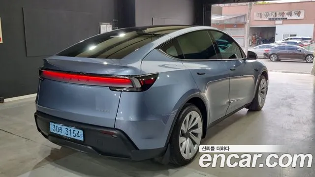 Tesla Model Y — Фото автомобиля 2