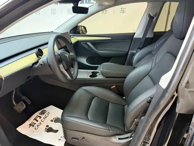 Tesla Model Y — Фото автомобиля 4