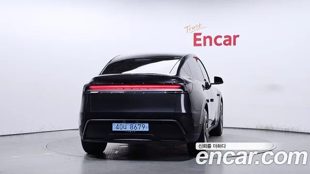 Tesla Model Y — Фото автомобиля 4