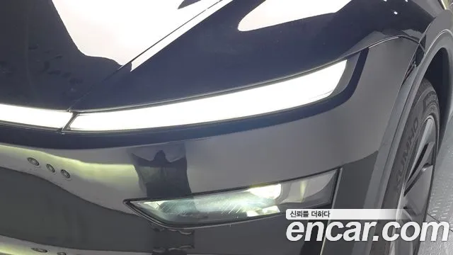 Tesla Model Y — Фото автомобиля 7