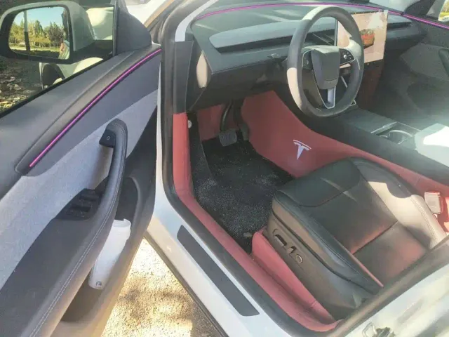 Tesla Model Y — Фото автомобиля 13