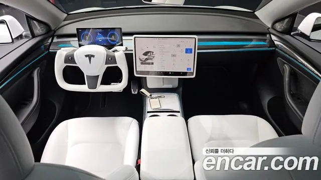 Tesla Model Y — Фото автомобиля 10