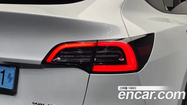 Tesla Model Y — Фото автомобиля 19